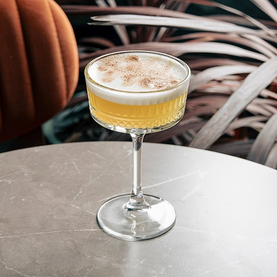 Expert bartender crafting cocktails at TheSolo Bar